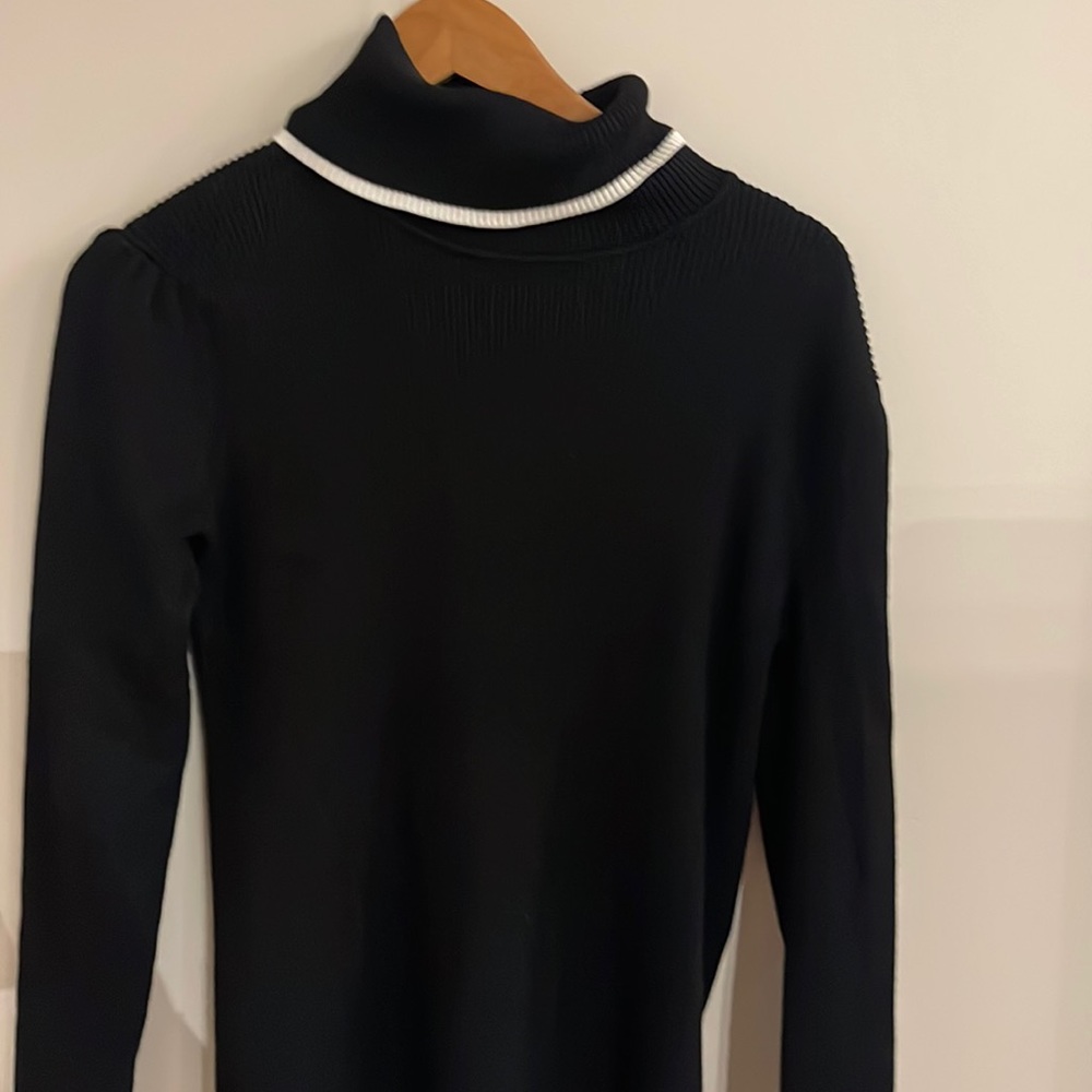 Calvin Klein black turtle neck with white stripe